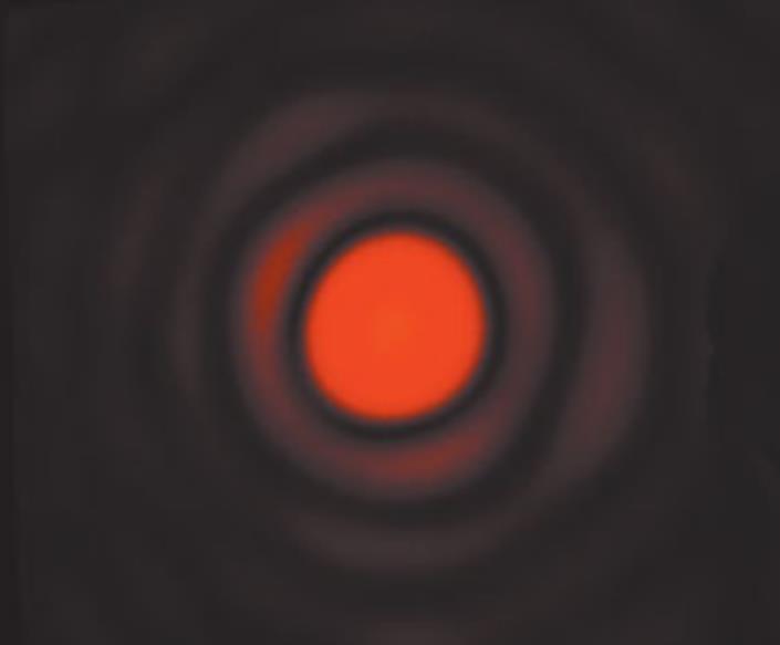 Figura 3: Padrão de difração de abertura circular. O máximo central é o disco de Airy. O disco escuro ao redor é o primeiro mínimo.