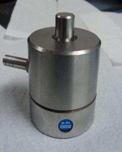 62 3.2.1. Compactação O MgO em pó foi colocado num molde pastilhador de aço NOUC D-01, com cavidade de 12 mm diâmetro (vide Figura 3.