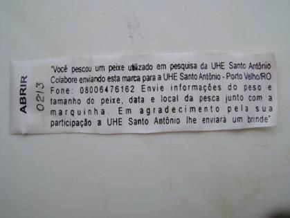 Exemplo de marca hidrostática tipo LEA (fechada), Mensagem desenrolada após abertura do envoltório plástico Figura 5-1 Exemplo de marca hidrostática tipo LEA (Godoy, 1962) Os exemplares capturados e