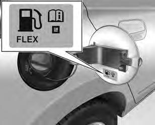 Solte a tampa de enchimento de combustível pressionando o botão K do sistema de travamento central ou o controle remoto e puxe a tampa para abri-la.