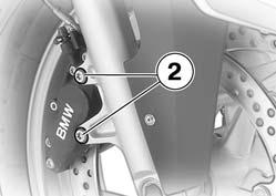 Verificar a colocação correcta do cabo do sensor ABS 7. Montar os parafusos de fixação 2 com binário.