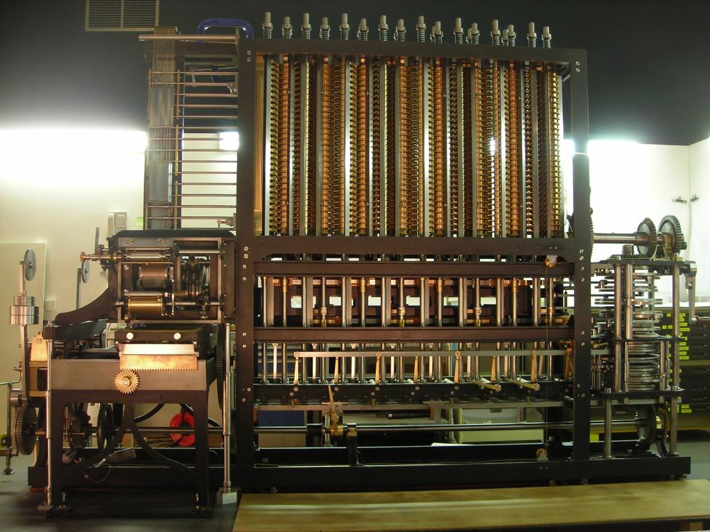 Máquina Analítica de Babbage Em 1834, desenvolveu uma máquina que seria capaz de efetuar uma grande variedade de cálculos.