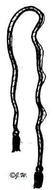 É um cordão de linho apertado na altura da cintura para ajustar a alva. É um símbolo de castidade.