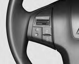 O sistema conforto e conveniência pode ser usado pelos controles do volante. Consulte Controles do Volante 0 112.