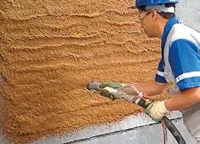 RevestJet Premium Argamassa projetada e textura colorida para aplicações sobre blocos, tijolos ou concreto APLICAÇÕES Revestimento monocamada para regularização e decoração de fachadas, paredes