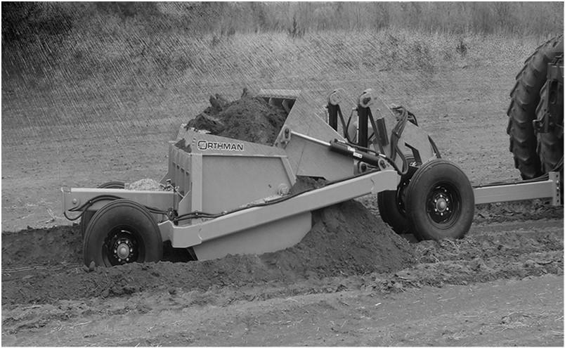 Escavação - Scrapers Os "scrapers" são equipamentos que têm a capacidade de realizar as operações de escavação, transporte e espalhamento; Podem operar a baixa velocidade, quando puxados por trator