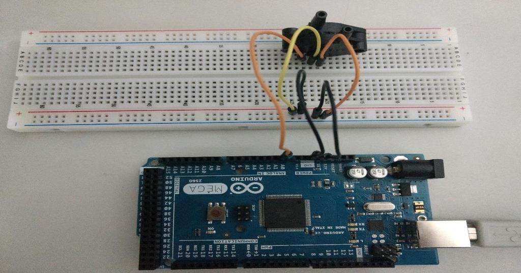 Figura 5: Arduino Conectado Ao Sensor Mpx5100dp Após um estudo acerca das possibilidades de comunicação entre o sensor e os programas existentes, foi definido que seria utilizado o Arduino para