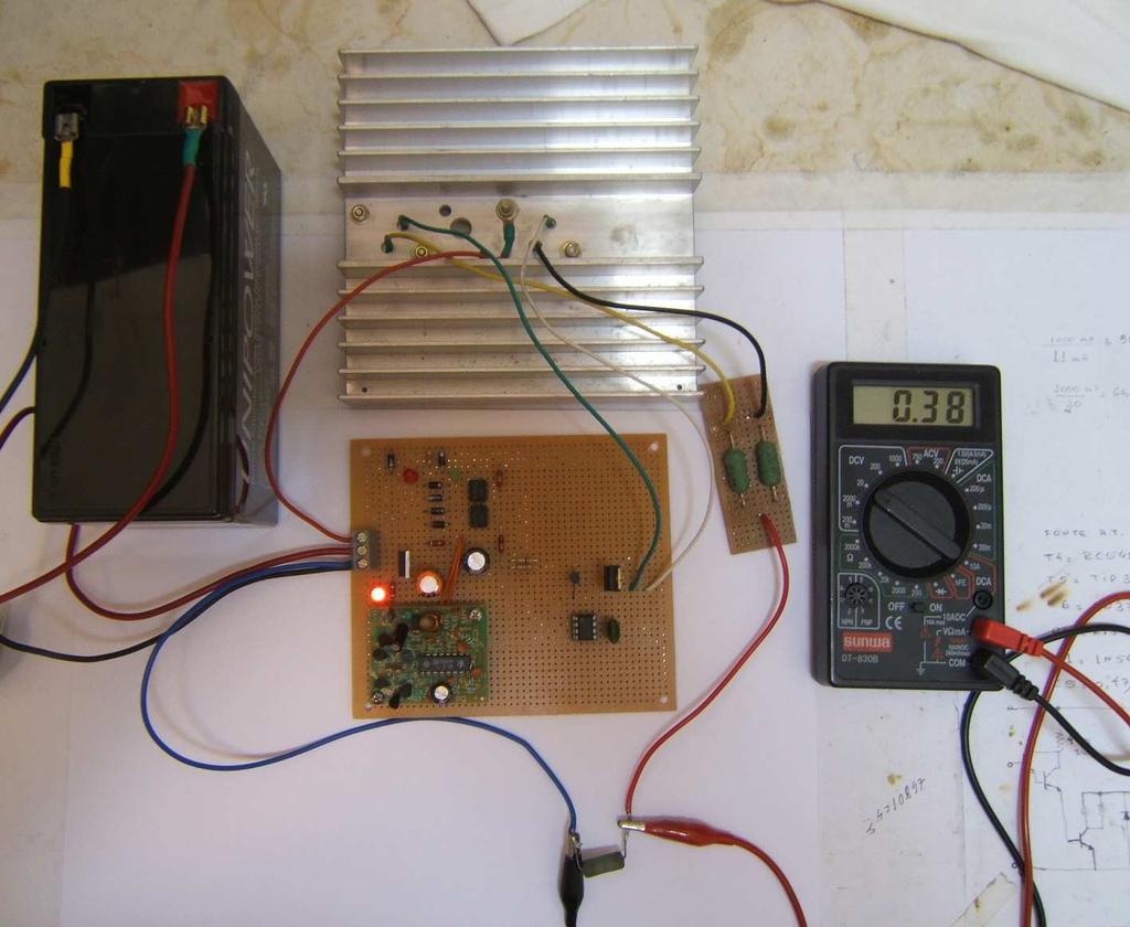 13 mostra a placa de circuito impresso padrão, com a disposição dos componentes. Figura II.