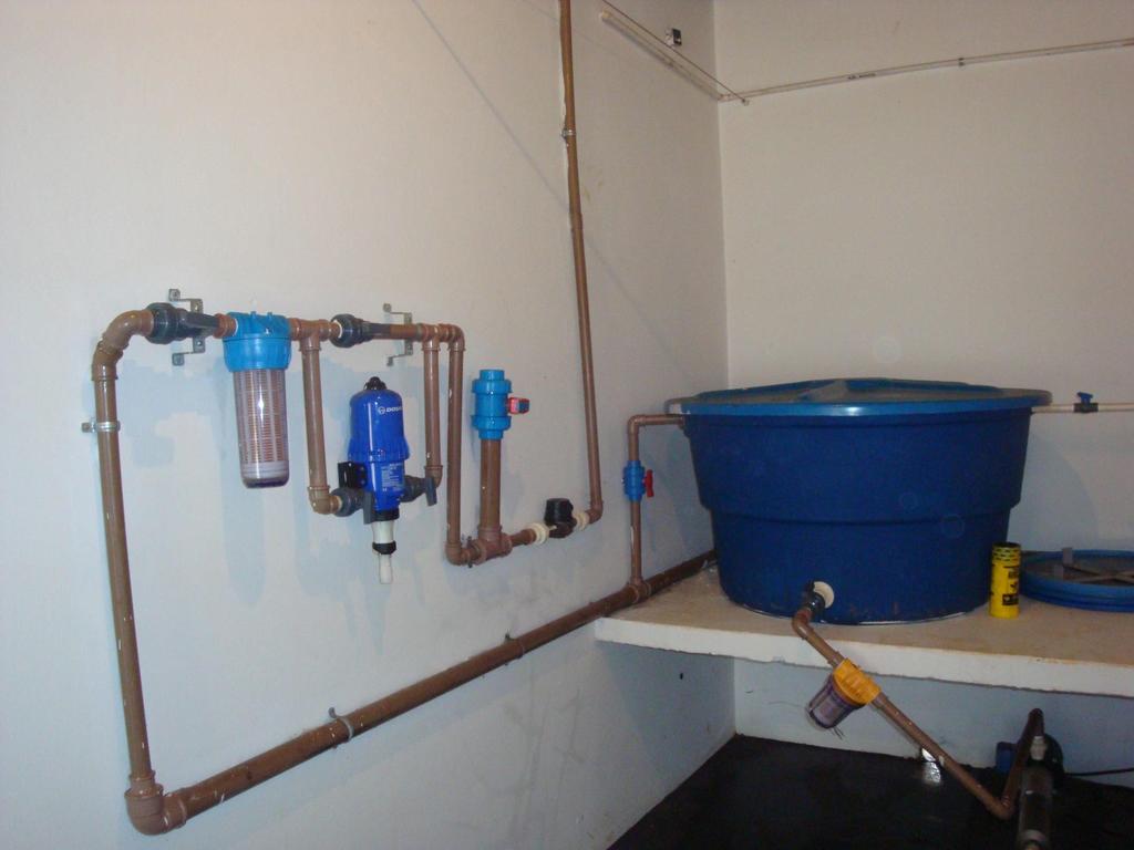 Equipamentos na Granja de Frango de Corte Fornecimento de água: Sistema de Tratamento de Água e Hidrômetro