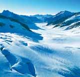No conforto de um vagão panorâmico podemos desfrutar da paisagem romântica dos alpes suíços: bosques densos, picos cobertos de neve, quedas d água belíssimas, montanhas e povoados com séculos de