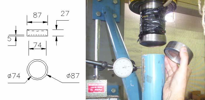 O topo do montante recebe o carregamento axial de compressão da célula de carga através de rótulas côncava e convexa, ver figura 3.