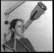 25 A execução dessa técnica é simples, bastando ajustar o posicionador ao dente a ser radiografado.