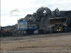 Escavadora frontal Escavadora frontal https://www.youtube.com/watch?v=pcnzbgslm_s Video from the oil sand mines of northern Alberta, Canada.