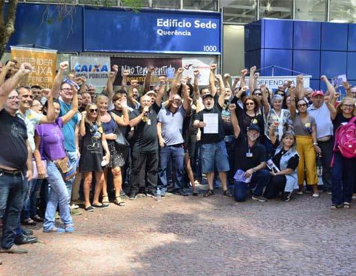 DIA NACIONAL DE LUTA EM DEFESA DA CAIXA Empregados da Caixa realizam Dia de Luta em todo o país O Dia Nacional de Luta em Defesa da Caixa mobilizou empregados em todo o país desde o início da manhã