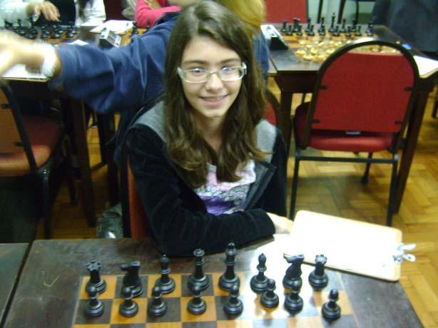 Eduarda de Freitas (pré-classificada 21) De Oliveira,G - Terao,J (2169) Rio de Janeiro (4.3), 28.05.2011 1.d4 Cf6 2.e3 e6 3.f4 c5 4.Cf3 b6 5.c3 Bb7 6.Bd3 Be7 7.0 0 Dc7 8.Bd2 d6 9.Be1 Cbd7 10.